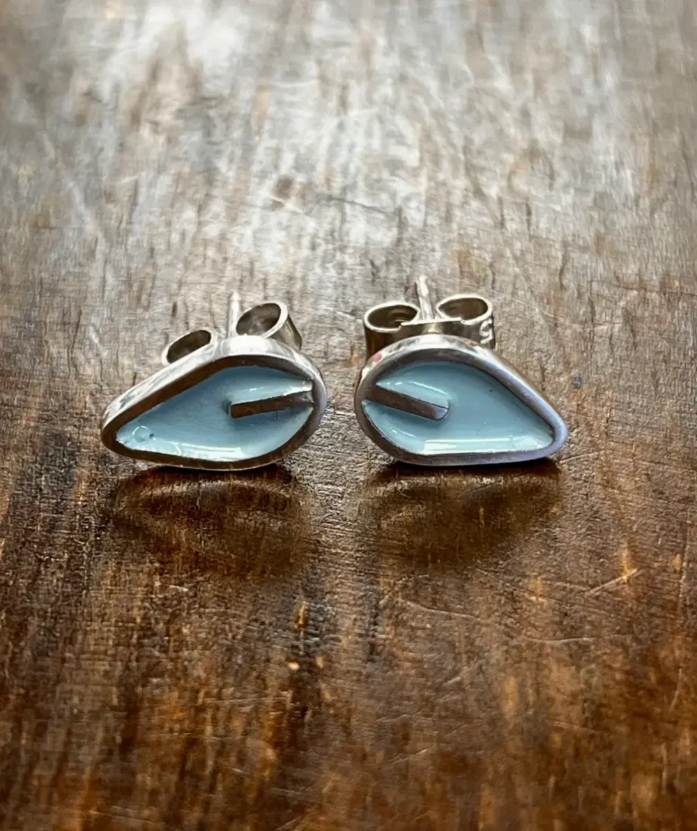 Solid Leaf silver stud earrings with a duck egg blue leaf