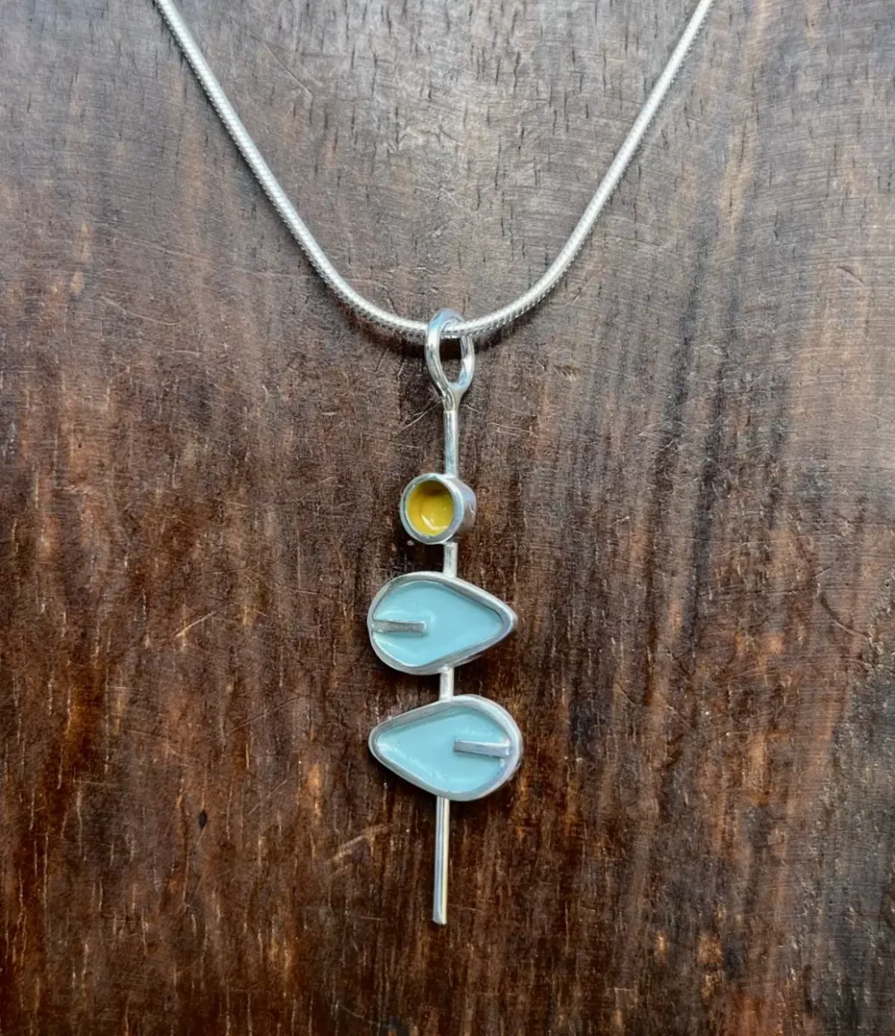 Double duck egg blue leaves and yellow dot, silver pendant