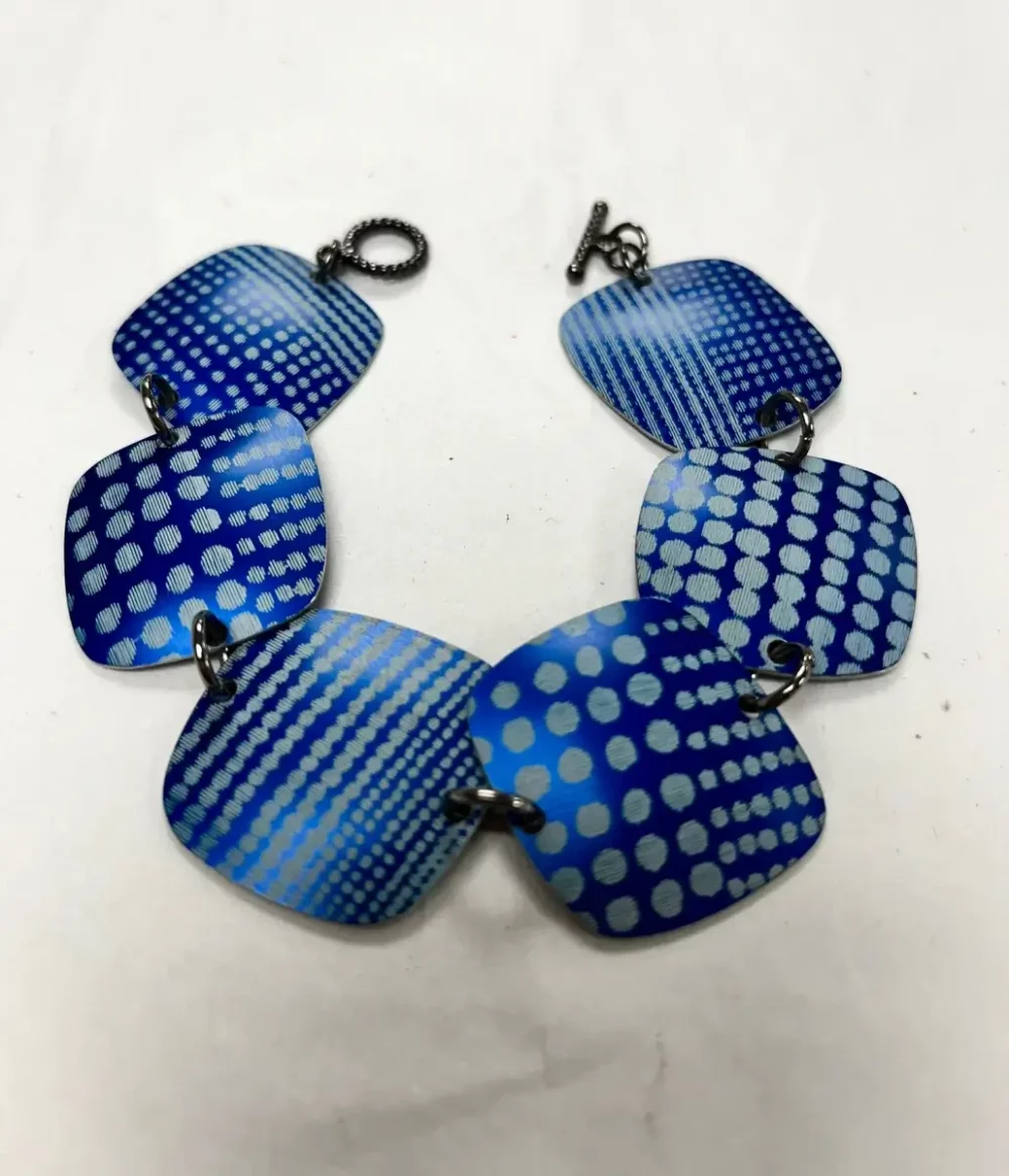 Laser-etched bracelet made with blue squares