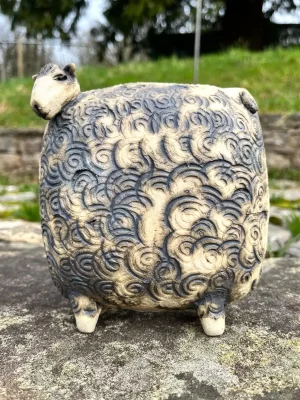 Small dark ceramic sheep 14428.webp